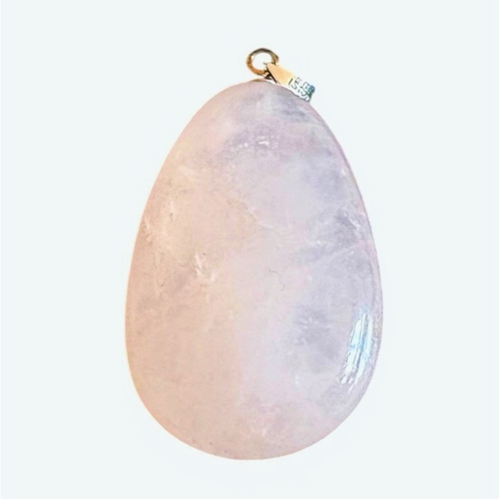 Elegant Genuine Rose Quartz Pendant with sterling silver clasp.